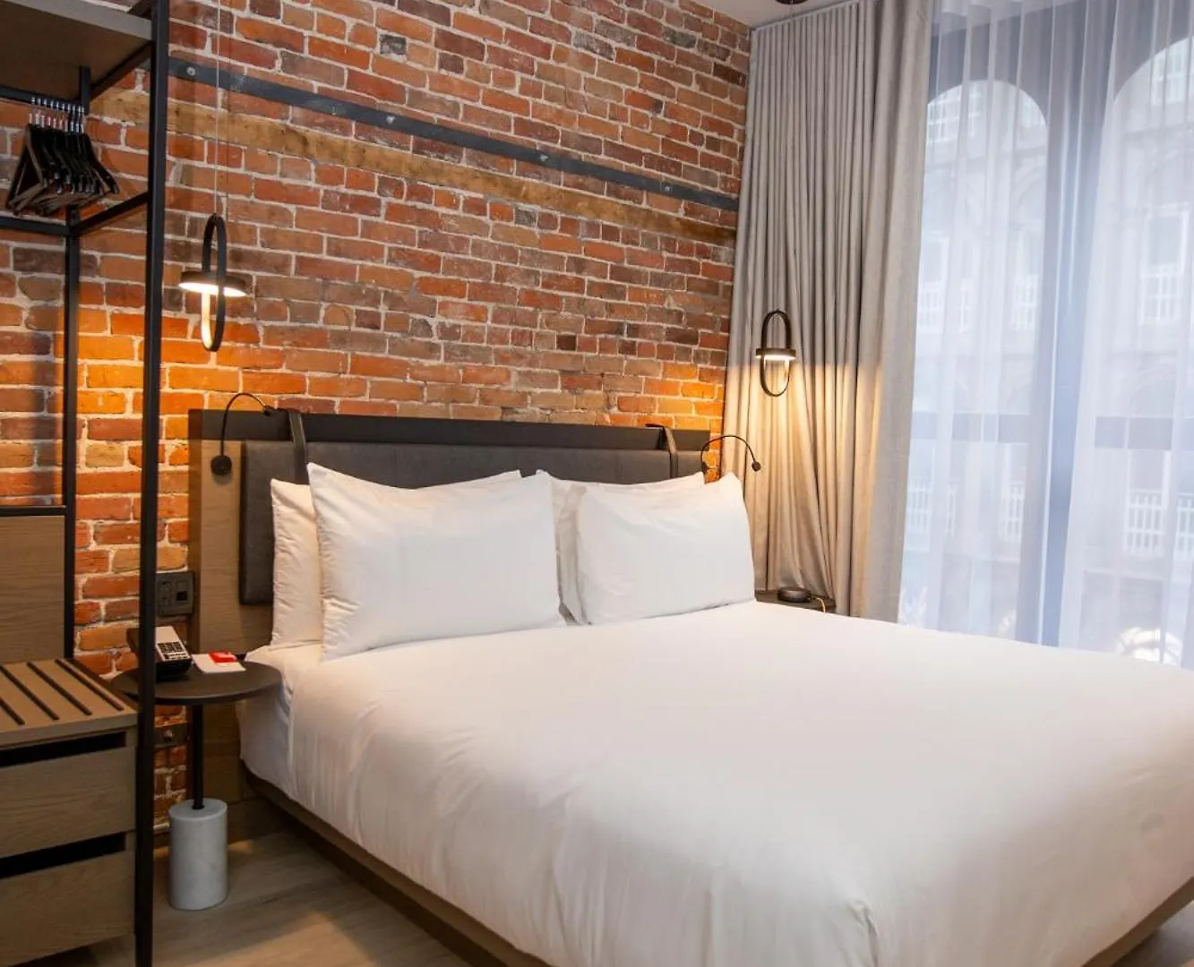 Contatos de Le Petit Hotel Notre Dame